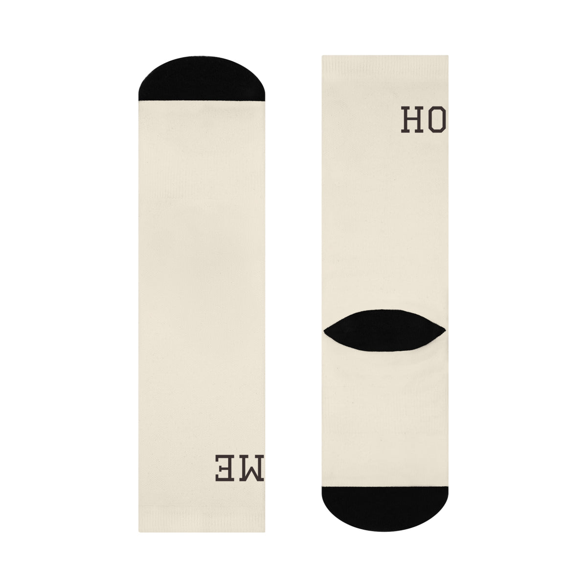 Flat lay detail of the Stay Home Socks showing the HOME wordmark and cushioned black heel