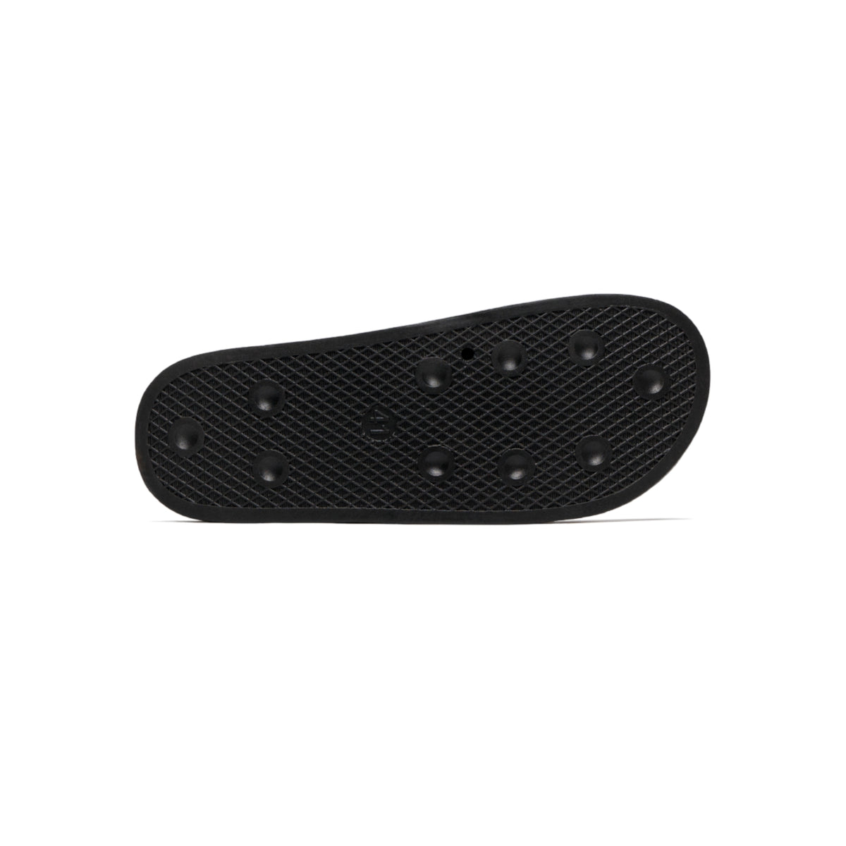 Stay Home Slides, close-up of the textured black rubber sole